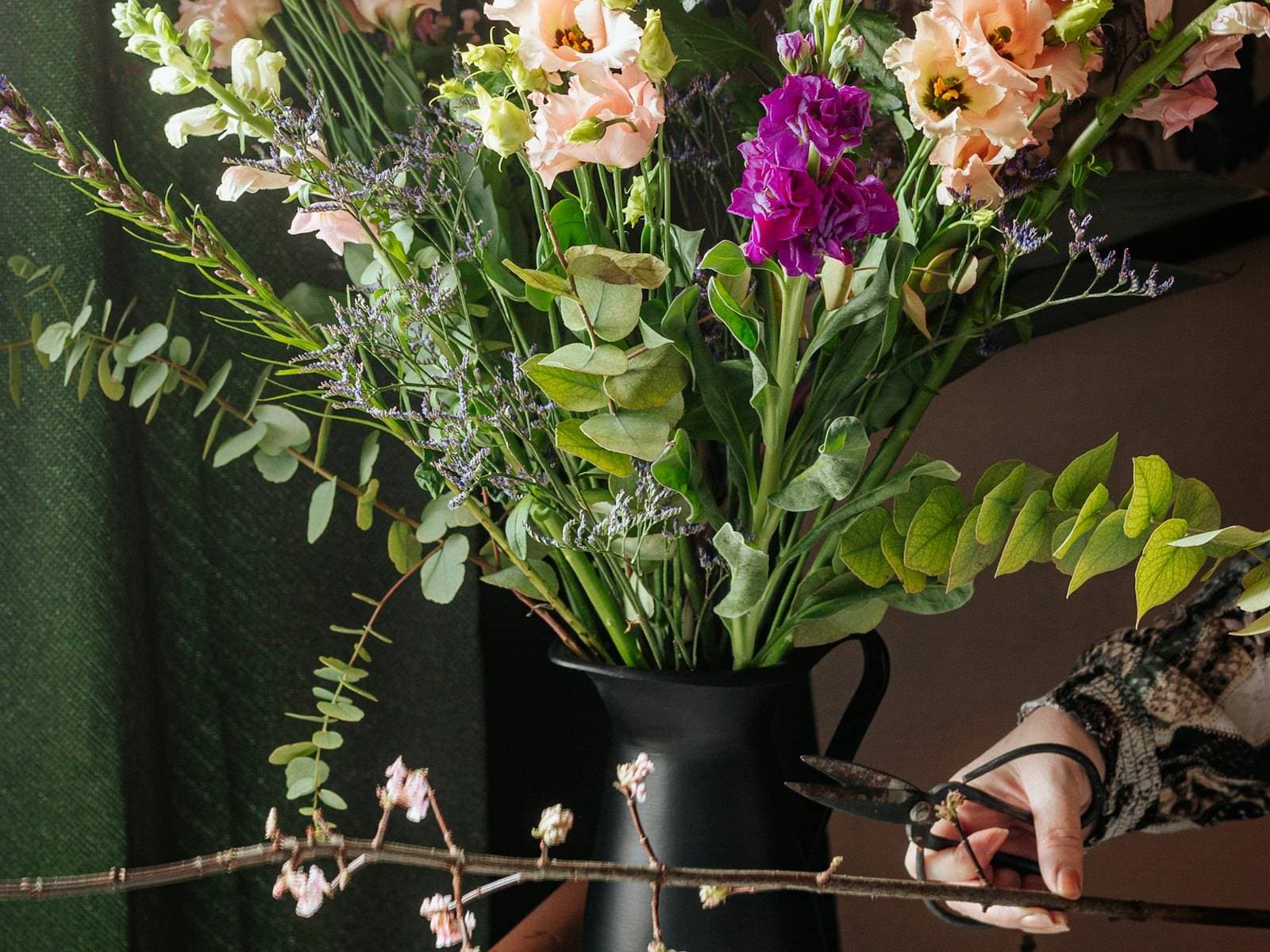 Wildflower arrangement in a dark jug